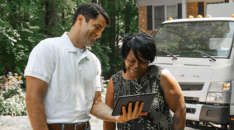 Junk Removal Expert with Client